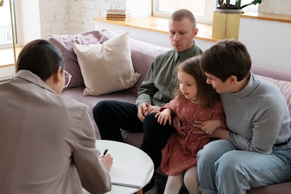 family speaking with legal representative about custody rights nwls family law assistance