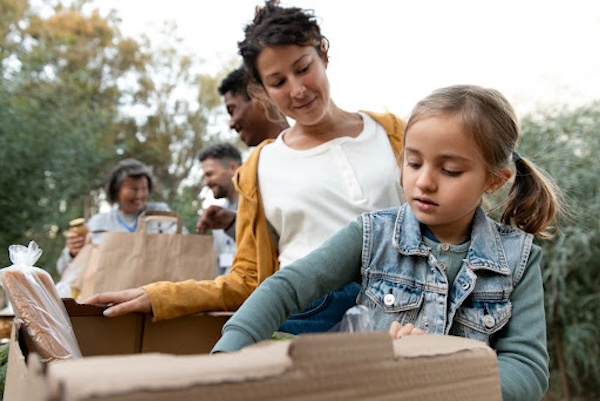 mother and daughter at food bank public benefits legal help nwls